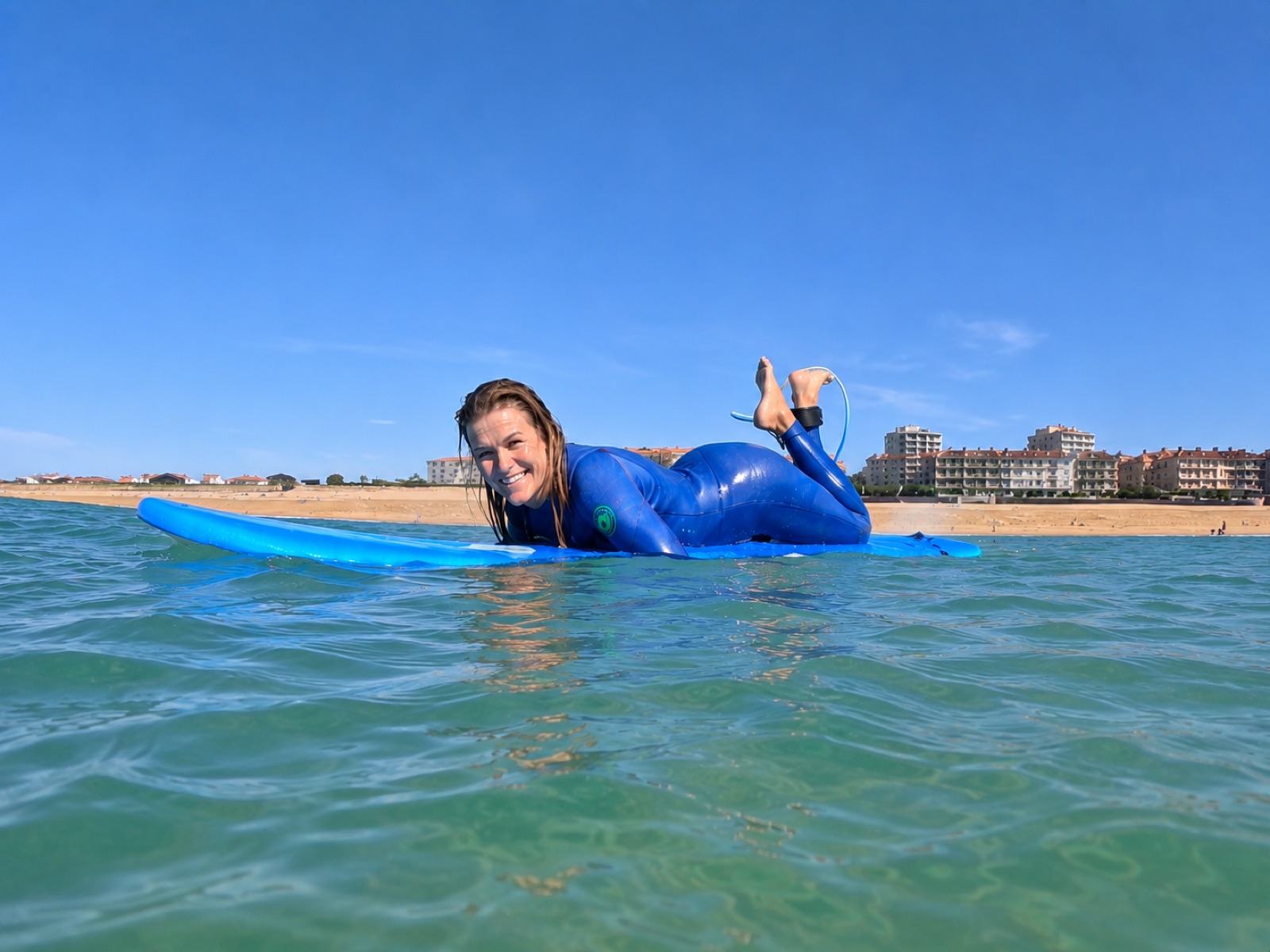 Annelies, coach and founder of Coco Surf School, smiling portrait
